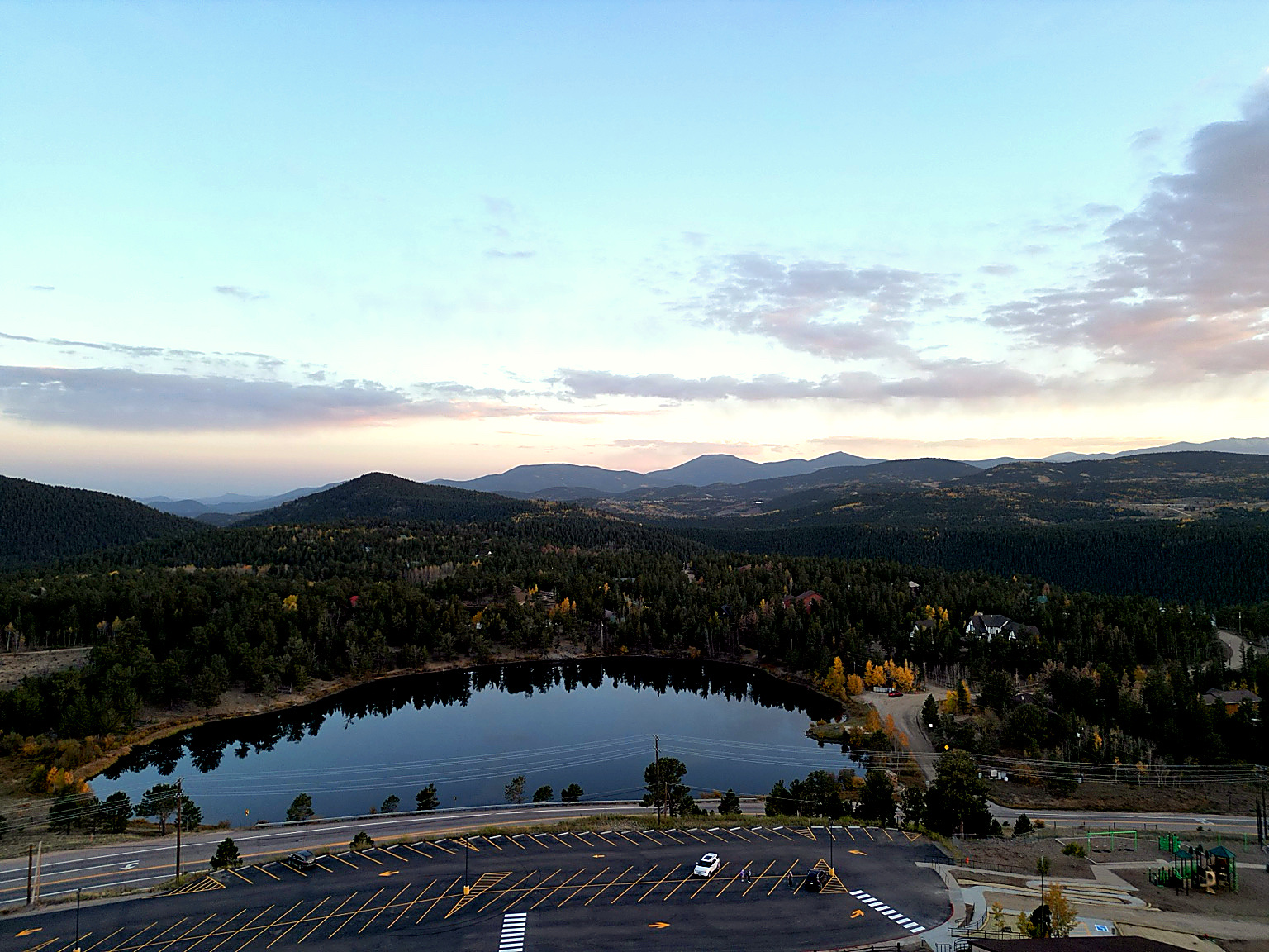 Aerial view of a mountain lake at dusk in the Colorado foothills